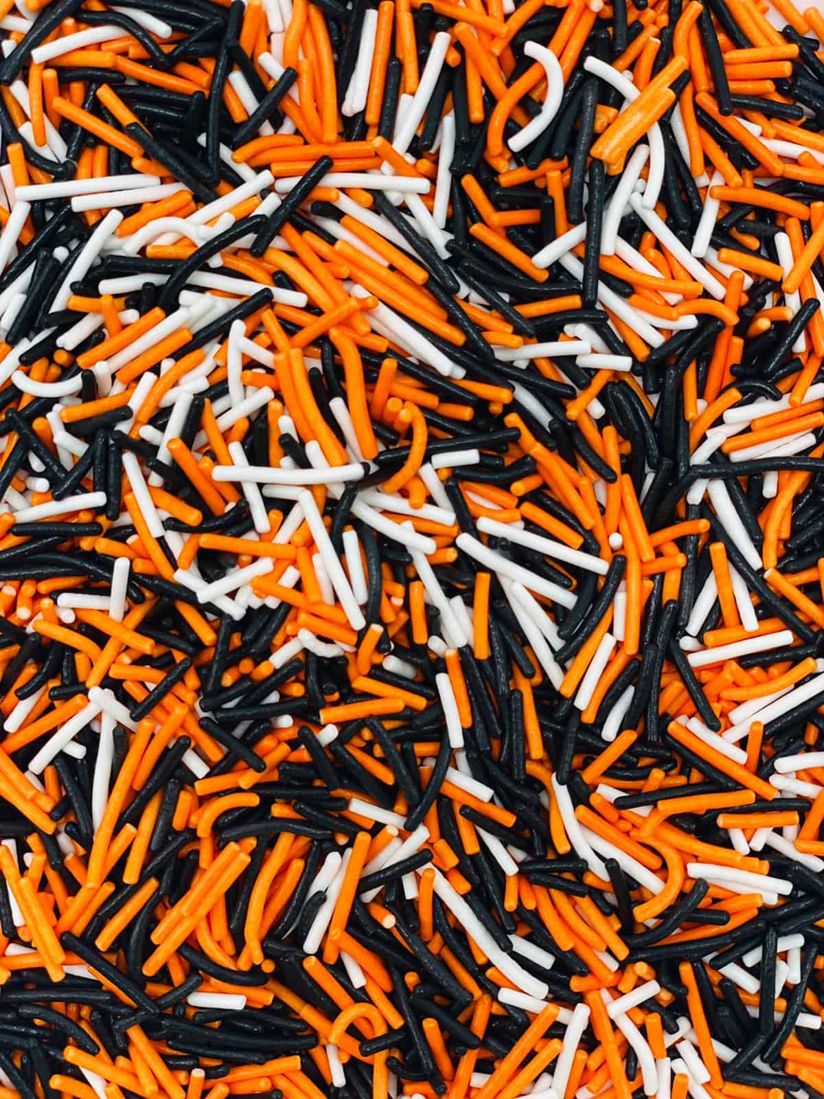 סוכריות איטריות שחור כתום לבן 1 קג – תמונה 1