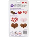 ⁦תבנית פלסטיק לב חצוי לשוקולד WILTON⁩ – תמונה ⁦2⁩
